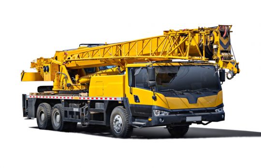 Truck Crane. Isolated object on a white background. (all logos, inscriptions and markings removed)